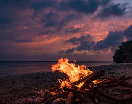 A fantastic sunset at the beach with a bonfire and BBQ on the island of Curacaio