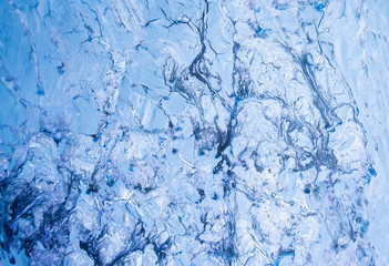 Fototapeta na wymiar Paint strokes and stains blue abstract background