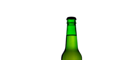Isolated top of green beer bottle over white background