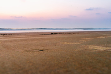 clean flat beach after the sunset.