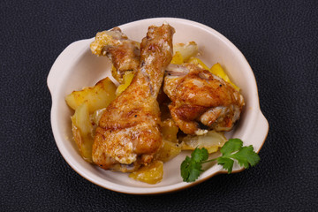 Roasted chicken legs with potato