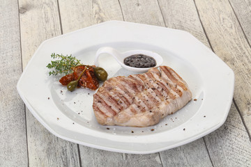 Grilled pork steak with pepper sauce