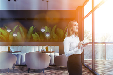 Woman in gray nature style cafe