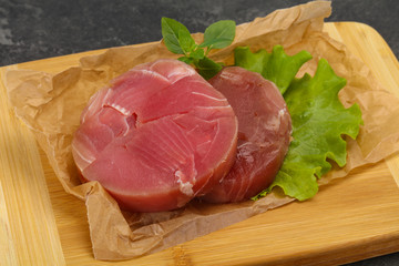 Raw tuna round steak for grill