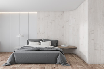 White and light wood bedroom interior