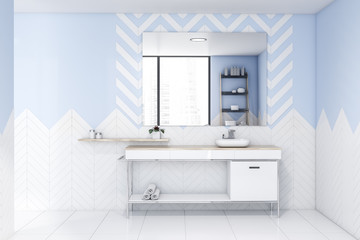 White and blue bathroom interior with sink