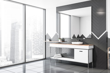 White and gray tile bathroom corner, sink