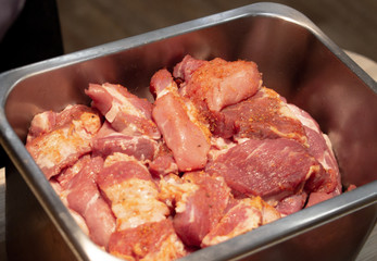 Pieces of meat are in the pot