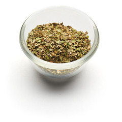 Origan dried isolated   in a glass plate