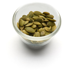 pumpkin seeds isolated in a glass plate