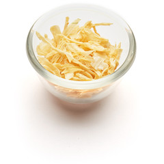 dried onion isolated in  a glass plate