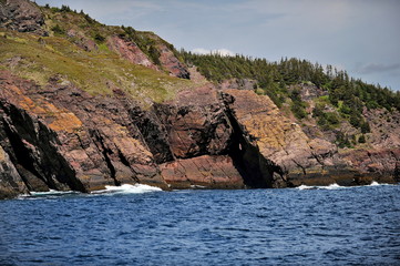 Beautiful stony shores of the Atlantic Ocean (Newfoundland Island, Canada).