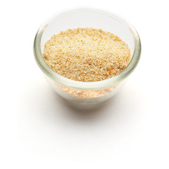 crushed dried garlic isolated in  a glass plate