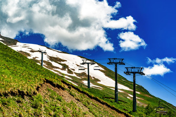 Obraz premium Mountain panorama in clouds. Caucasus, region Dombay.
