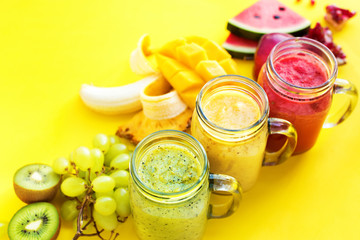 Juices smoothie red green yellow Tropical fruits