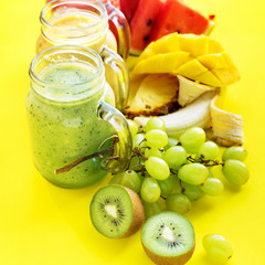 Juices smoothie red green yellow Tropical fruits