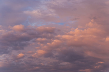 Naklejka na ściany i meble Beautiful sunrise pink soft sky with clouds background texture, heaven
