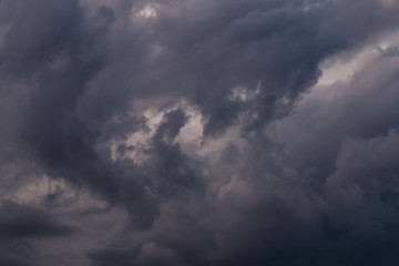 Fototapeta na wymiar Storm clouds texture closeup, dark sky background texture