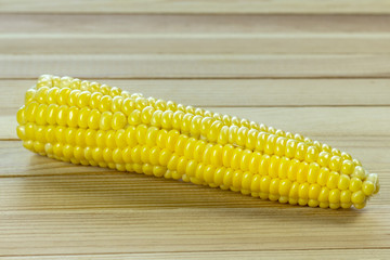 sweet corn on wooden background