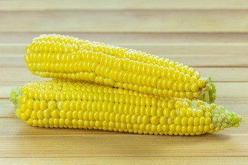 sweet corn on wooden background
