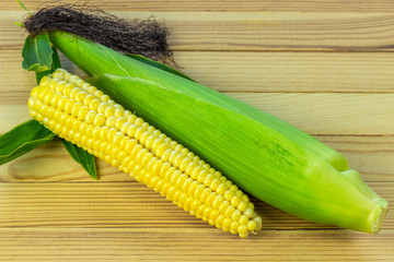 sweet corn on wooden background