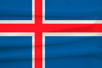 Fototapeta premium national flag of the country iceland on delicate silk with creases from the wind, concept of travel, immigration, politics, copy space, close-up