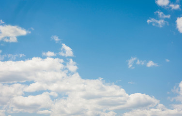 Beautiful natural blue sky background with clouds in sunny day.