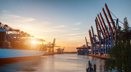 container terminal in Hamburg during sunset