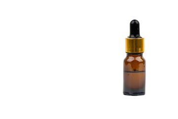 Dropper serum and brown glass bottle isolated on white background. Skin care, drug and cosmetic concept