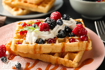 Beautiful composition with sweet belgian waffles, space for text