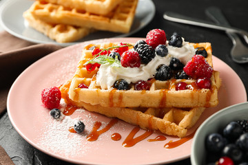 Beautiful composition with sweet belgian waffles, space for text