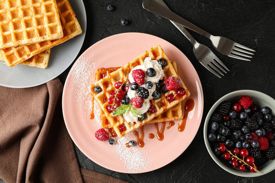 Beautiful composition with sweet belgian waffles, top view