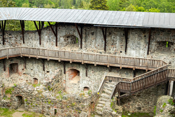 Obraz premium Medieval Raseborg castle courtyard on a rock in Finland at summer