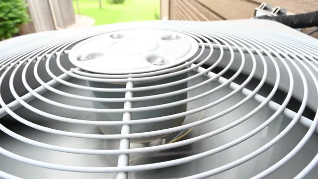 Starting a residential air conditioning unit outdoors with fan and coils