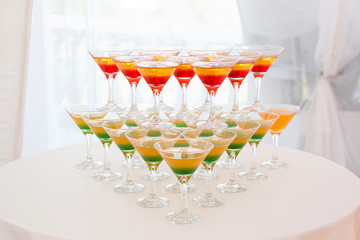 Champagne pyramid with waitress on event, party or wedding banquet reception