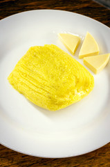 Pamonha, Brazilian sweet corn with cheese filling. Pamonha typical of Brazil, food of the state of minas gerais and goiais. Concept of traditional food. Brazilian food at rural parties