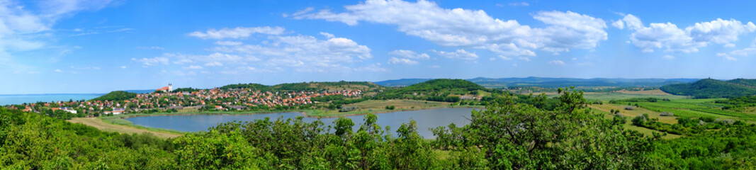 Fototapeta na wymiar Panoramic view of Tihany village with the Lake Balaton and the inner lake and the rural with hills, meadows and forests