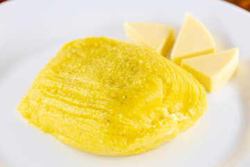 pamonha, Brazilian sweet made from homemade cheese with corn. Open pissing ready for consumption....