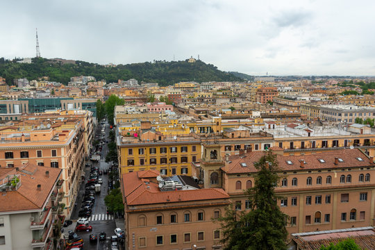 View of Rome streets and townhouses on a rainy day