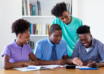 African american teacher learning with students