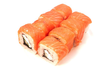 Rolls with salmon soy sauce on a plate