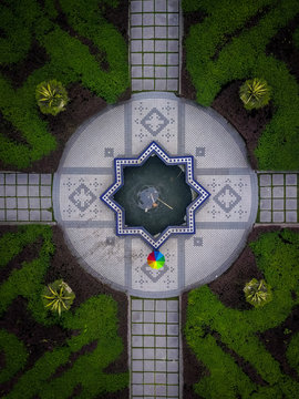 Aerial view of fountain in hedge maze