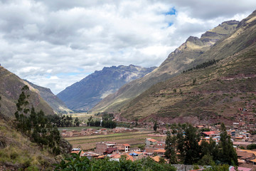 Fototapeta na wymiar View of Pisac Archaeological Park and green mountains of the Sacred Valley of the Incas, Peru