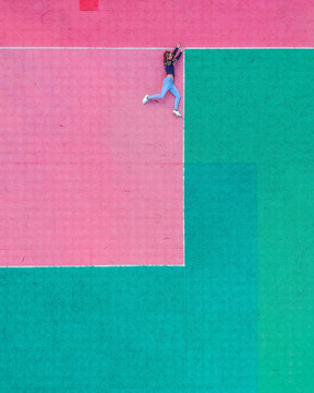 girl lies on mat