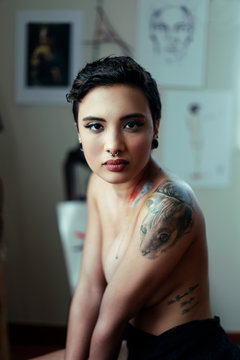 girl sits without dress