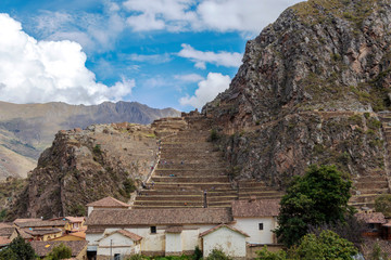 Fototapeta na wymiar Ollantaytambo ruins, a massive Inca fortress with large stone terraces on a hillside, tourist destination in Peru