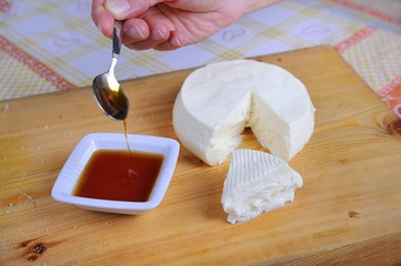casatella Italian cheese with bread and honey