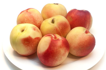 Fresh nectarines isolated on white background