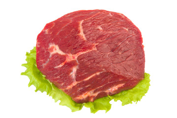 Fresh raw beef with green salad isolated on white background, top view