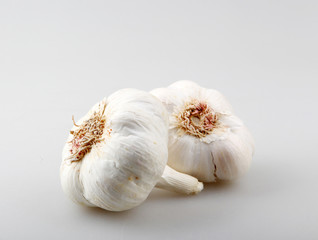 Close-Up Of Garlic Against Gray Background
